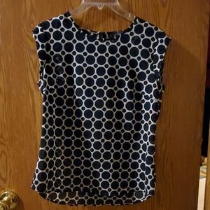 Limited polka dot high-low blouse.